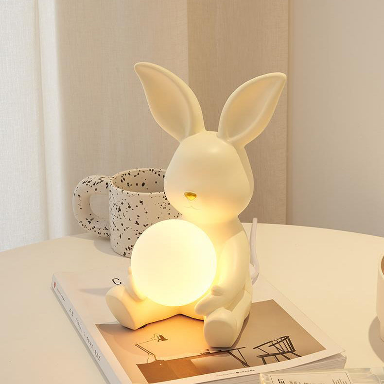 Moderne Art Deco Cartoon-Kaninchenform Runde Harz Glas 1-Licht Tischlampe für Schlafzimmer 