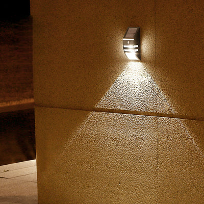 Applique murale LED en acier inoxydable ABS PC trapézoïdale étanche à l'énergie solaire minimaliste moderne pour extérieur 