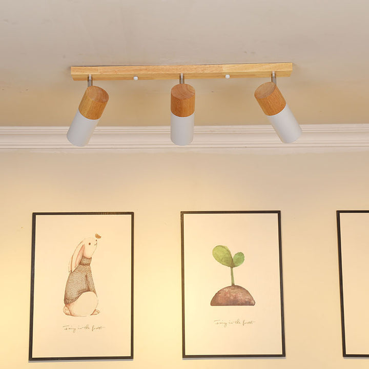 Zeitgenössisches nordisches verstellbares lineares Zylinderholz-Aluminium-Spotlight 3-Licht-Deckenleuchte für das Schlafzimmer 