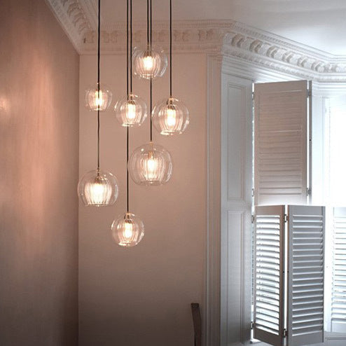 Zeitgenössische nordische runde Kugel Eisen Glas 1-Licht Pendelleuchte für das Esszimmer 