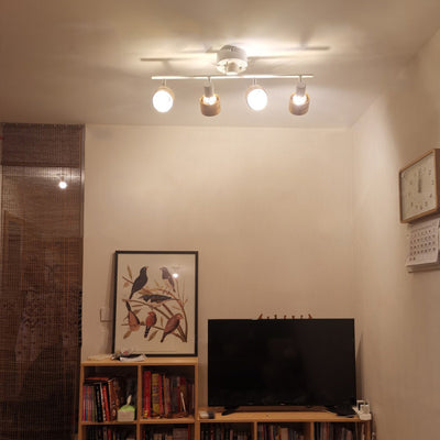 Zeitgenössisches Nordisches Zylinder Lineares Eisen Holz Spotlight 4-Licht Semi-Flush Mount Deckenleuchte Für Wohnzimmer 