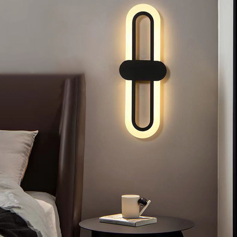 Moderne minimalistische ovale Aluminium-Acryl-LED-Wandleuchte für das Schlafzimmer 