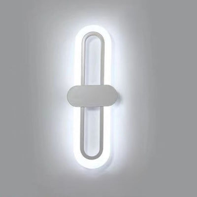 Moderne minimalistische ovale Aluminium-Acryl-LED-Wandleuchte für das Schlafzimmer 