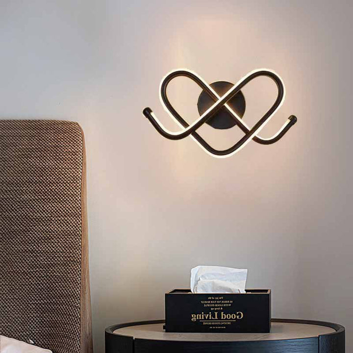 Applique murale LED en fer, aluminium et silicone créative contemporaine pour chambre 