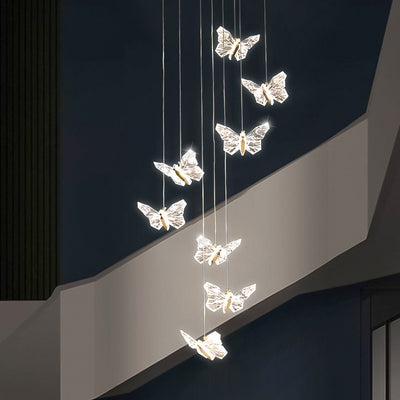 Moderna lámpara de araña redonda de mariposa creativa de aleación de zinc y acrílico LED para dormitorio 