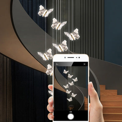 Moderna lámpara de araña redonda de mariposa creativa de aleación de zinc y acrílico LED para dormitorio 