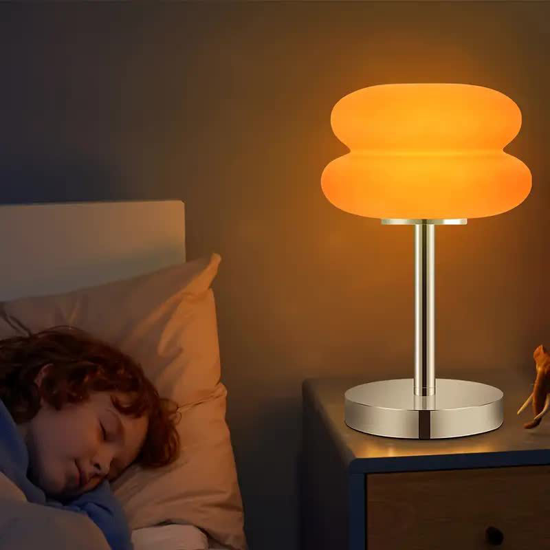 Zeitgenössische kreative Torten-Eisen-Glas-LED-Tischlampe für das Schlafzimmer 