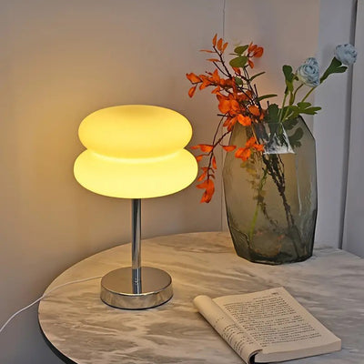 Zeitgenössische kreative Torten-Eisen-Glas-LED-Tischlampe für das Schlafzimmer 