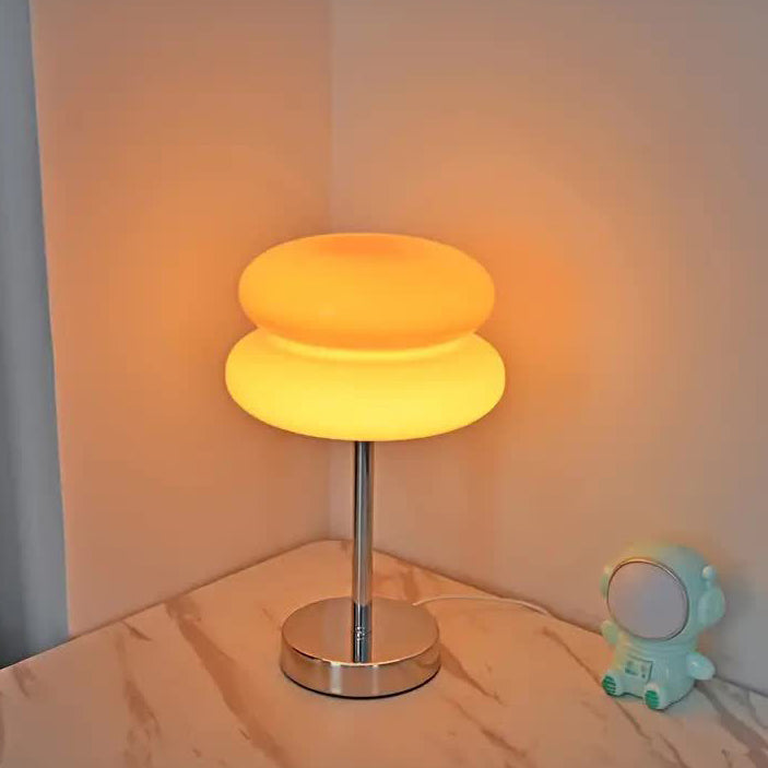 Zeitgenössische kreative Torten-Eisen-Glas-LED-Tischlampe für das Schlafzimmer 