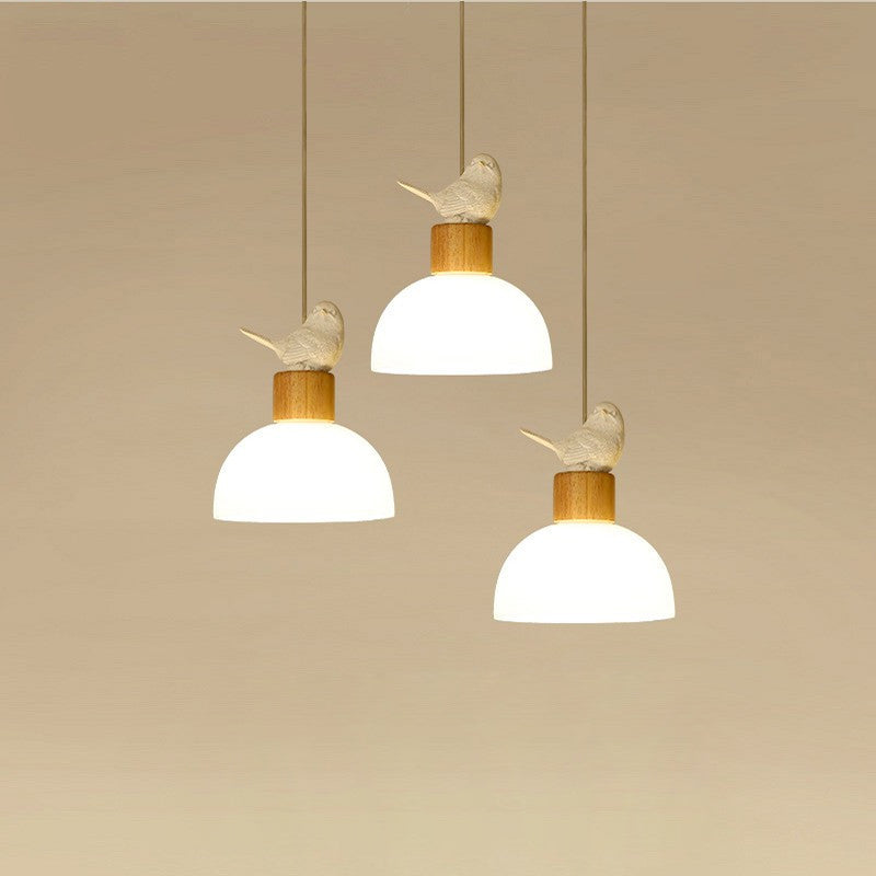 Zeitgenössische nordische Vogelkuppel aus massivem Holz Glas 1-Licht Pendelleuchte für das Schlafzimmer 