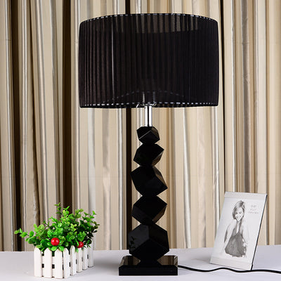 Lámpara de mesa de 1 luz de cilindro de metal de lujo moderno con cristal y tela para dormitorio 