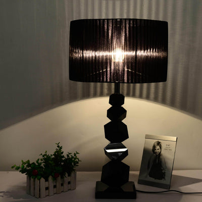 Lámpara de mesa de 1 luz de cilindro de metal de lujo moderno con cristal y tela para dormitorio 