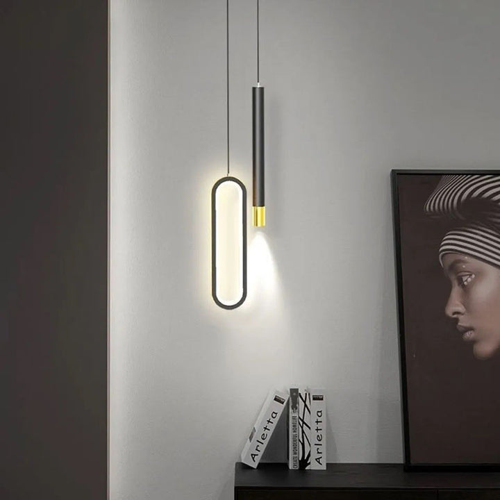 Moderna lámpara colgante minimalista elíptica de hierro, aluminio y acrílico LED para dormitorio 