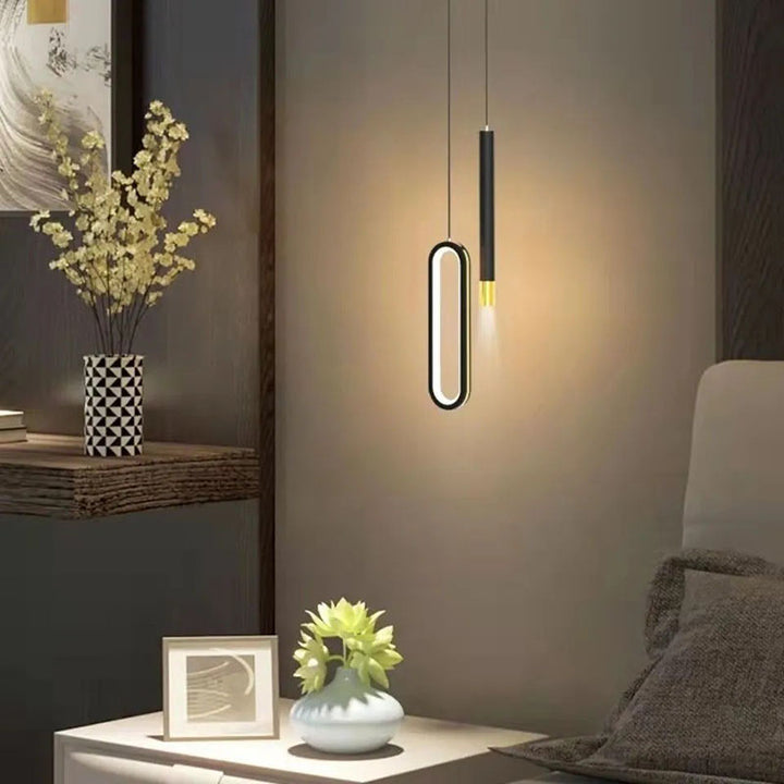 Moderna lámpara colgante minimalista elíptica de hierro, aluminio y acrílico LED para dormitorio 