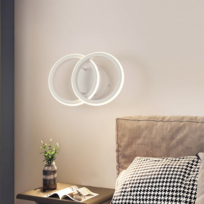 Moderne minimalistische runde Eisen-Silikon-LED-Wandleuchte für das Wohnzimmer 