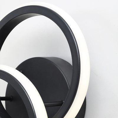 Moderne minimalistische runde Eisen-Silikon-LED-Wandleuchte für das Wohnzimmer 