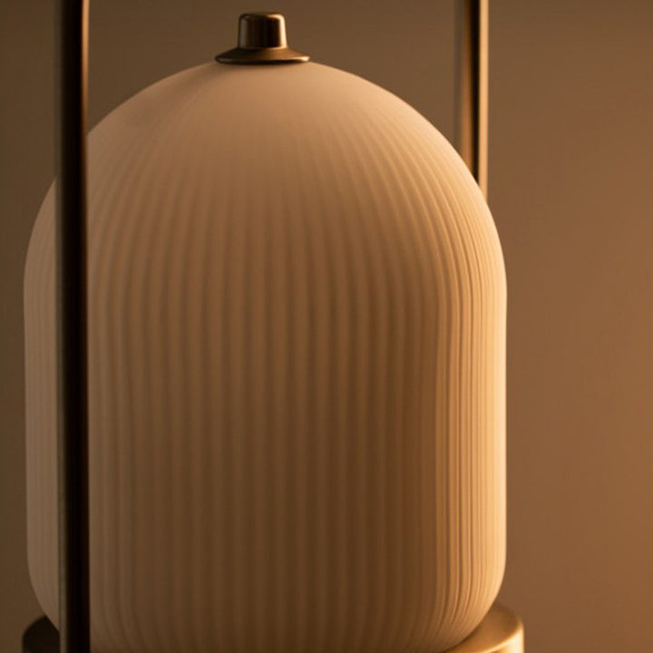 Lámpara de mesa LED USB portátil inductiva de vidrio y hierro metálico ovalado minimalista moderno para dormitorio 