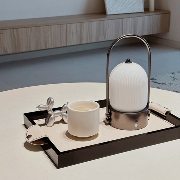 Lámpara de mesa LED USB portátil inductiva de vidrio y hierro metálico ovalado minimalista moderno para dormitorio 