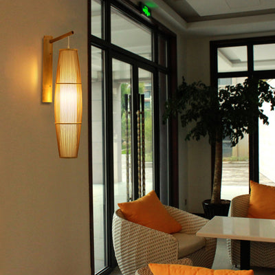 Traditionelle chinesische zylindrische runde PVC-Holz 1-Licht Wandleuchte für Wohnzimmer 