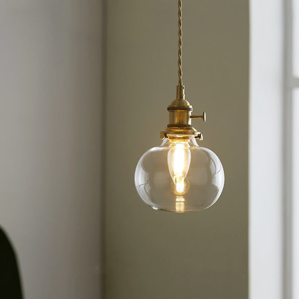 Lustre suspendu contemporain nordique en verre avec boule cylindrique en laiton à 1 lumière pour salon 