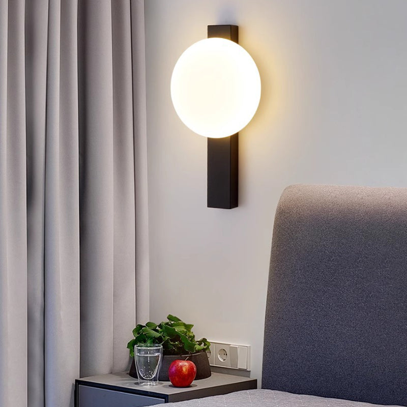 Applique murale LED en fer acrylique ronde contemporaine scandinave pour chambre à coucher 