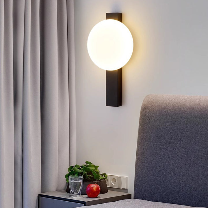 Applique murale LED en fer acrylique ronde contemporaine scandinave pour chambre à coucher 