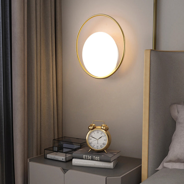 Applique murale LED en fer acrylique ronde contemporaine scandinave pour chambre à coucher 