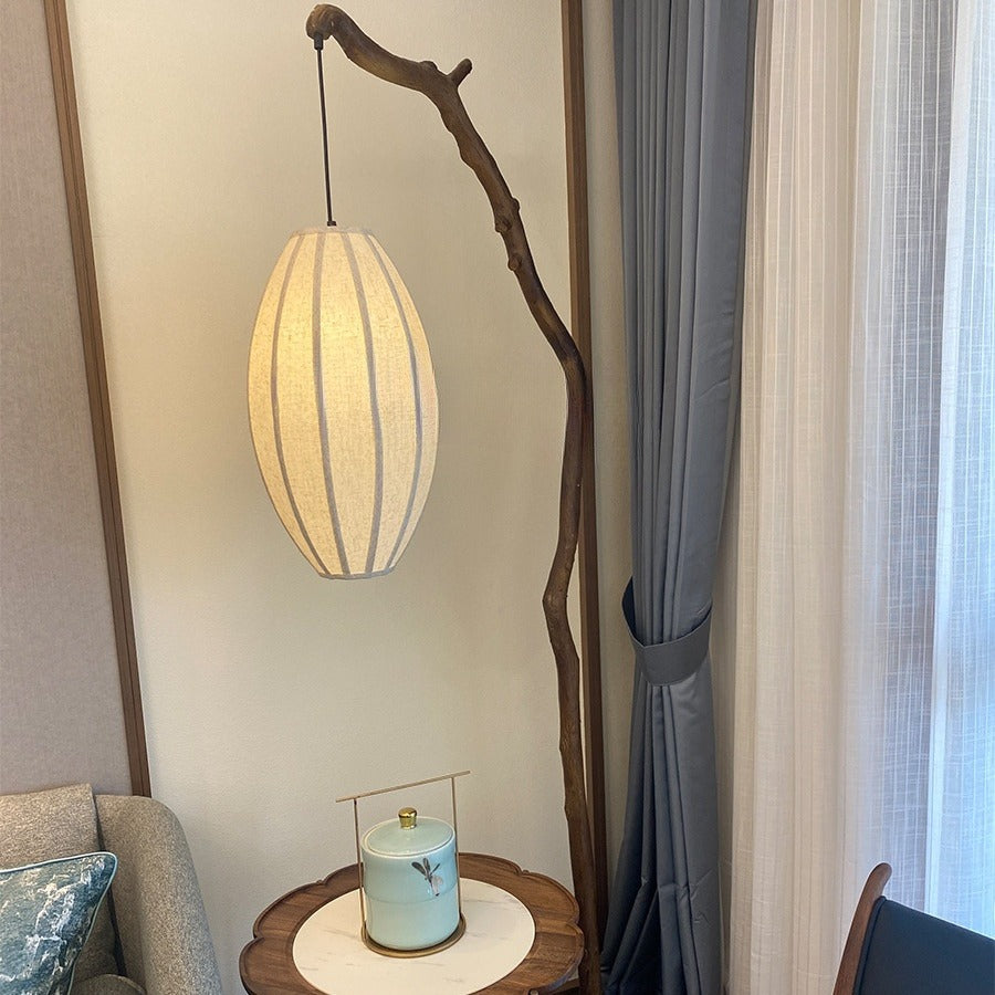 Lampadaire traditionnel chinois en résine et tissu avec lanterne elliptique à une lumière pour salon 