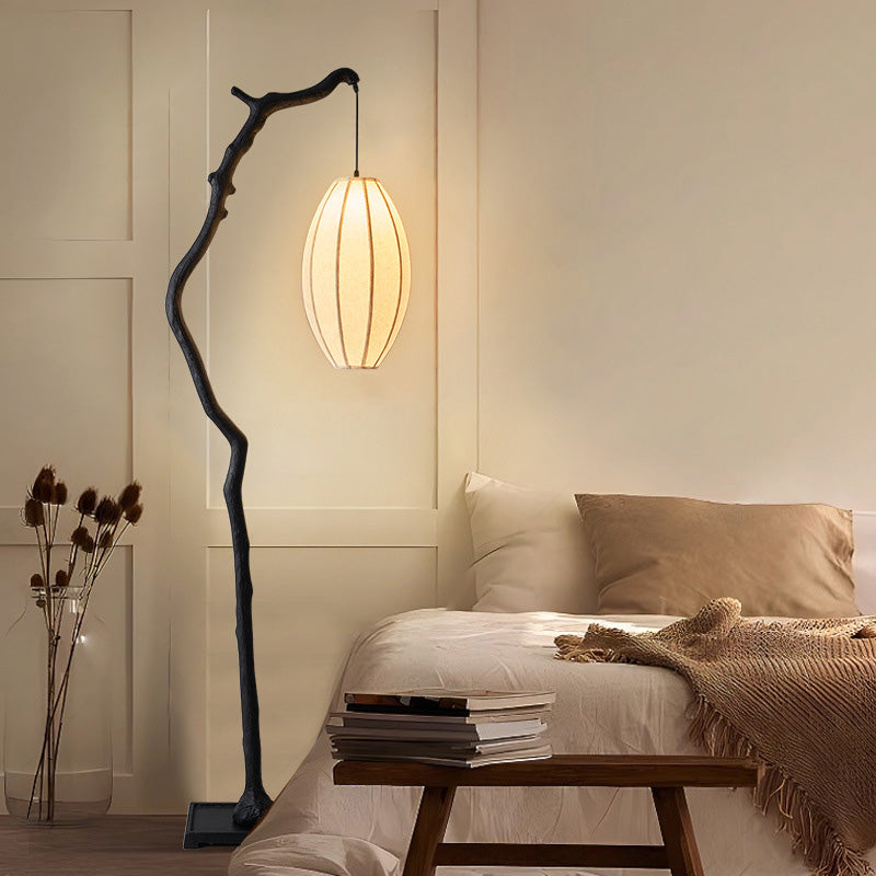 Lampadaire traditionnel chinois en résine et tissu avec lanterne elliptique à une lumière pour salon 
