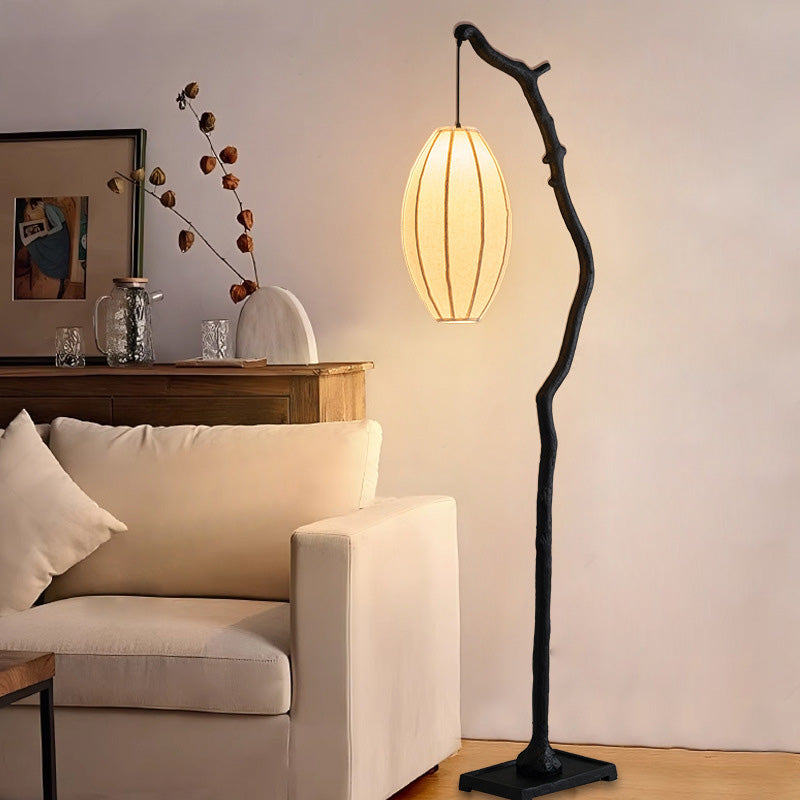Lampadaire traditionnel chinois en résine et tissu avec lanterne elliptique à une lumière pour salon 