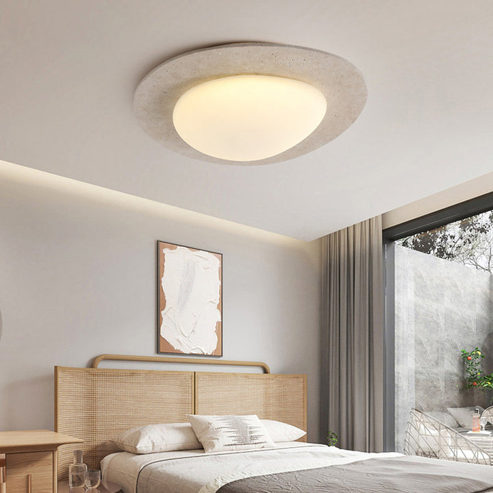 Plafonnier LED elliptique contemporain en travertin nordique en plastique pavé pour salon 
