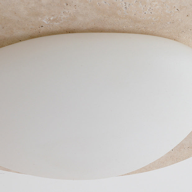 Zeitgenössische nordische Travertin-Kunststoff-Kopfsteinpflaster-elliptische LED-Unterputz-Deckenleuchte für Wohnzimmer 