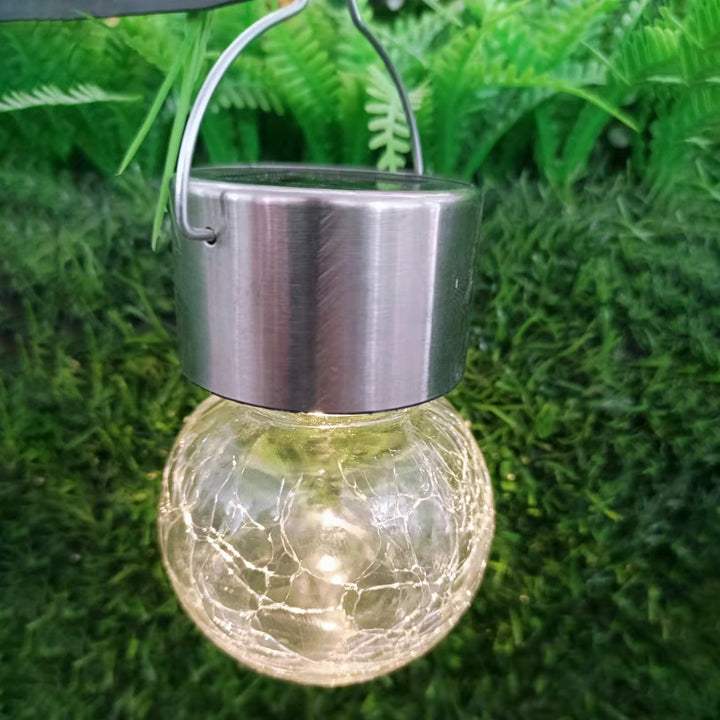 Moderno arte deco solar impermeable de acero inoxidable plástico vidrio bola LED crujiente iluminación de paisaje luz exterior para jardín 