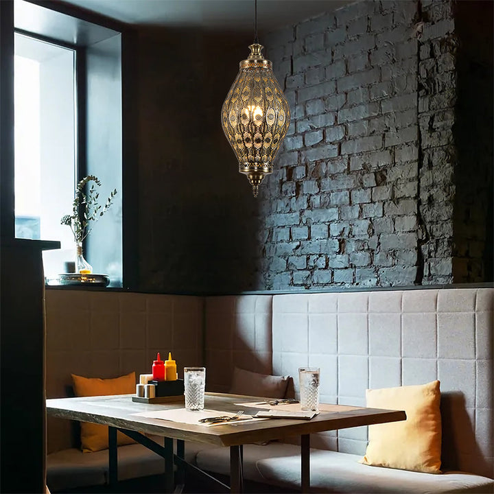 Suspension moderne bohème elliptique en fer ajouré à 1 lumière pour salle à manger 