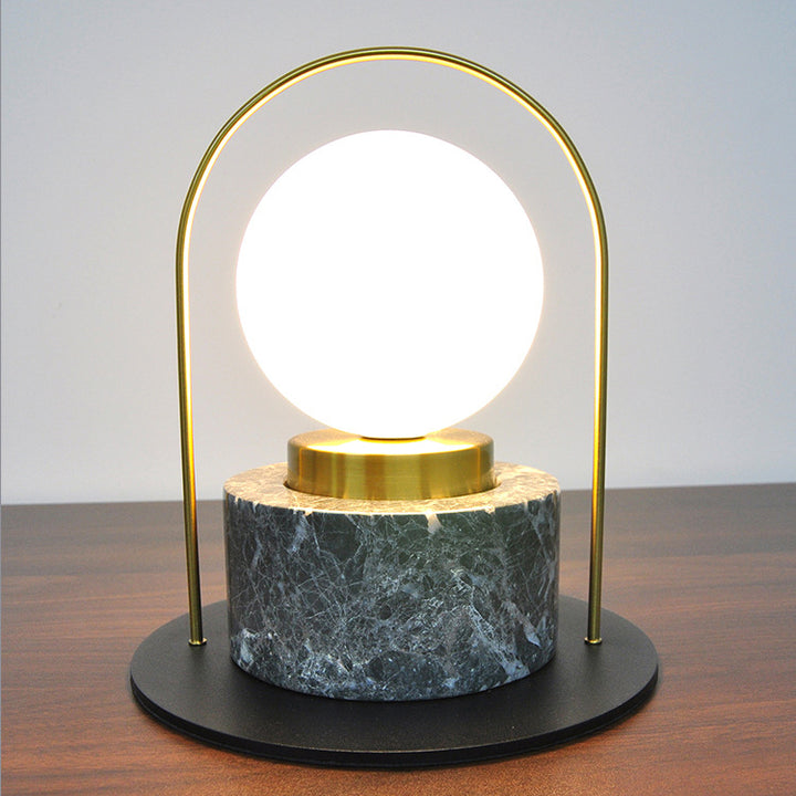 Moderner Übergangs-Marmor-Glas-Metallkugel-Ovalgriff 1-Licht-Tischlampe für das Studium 