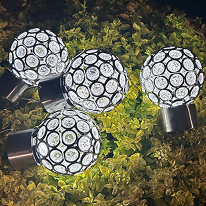 Zeitgenössische kreative solarbetriebene wasserdichte hohle Kugel aus ABS-Kunststoff hängende LED-Außenleuchte Landschaftsbeleuchtung für den Garten 