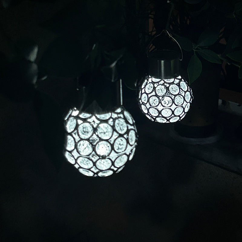 ضوء LED خارجي معلق مصنوع من البلاستيك ABS المقاوم للماء بتصميم كرة مجوفة إبداعية عصرية لإضاءة المناظر الطبيعية في الحديقة 