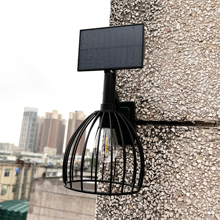 Zeitgenössische industrielle solarbetriebene wasserdichte Hardware ABS Rundkäfig 1-Licht Wandleuchte für Außenbereich Patio 