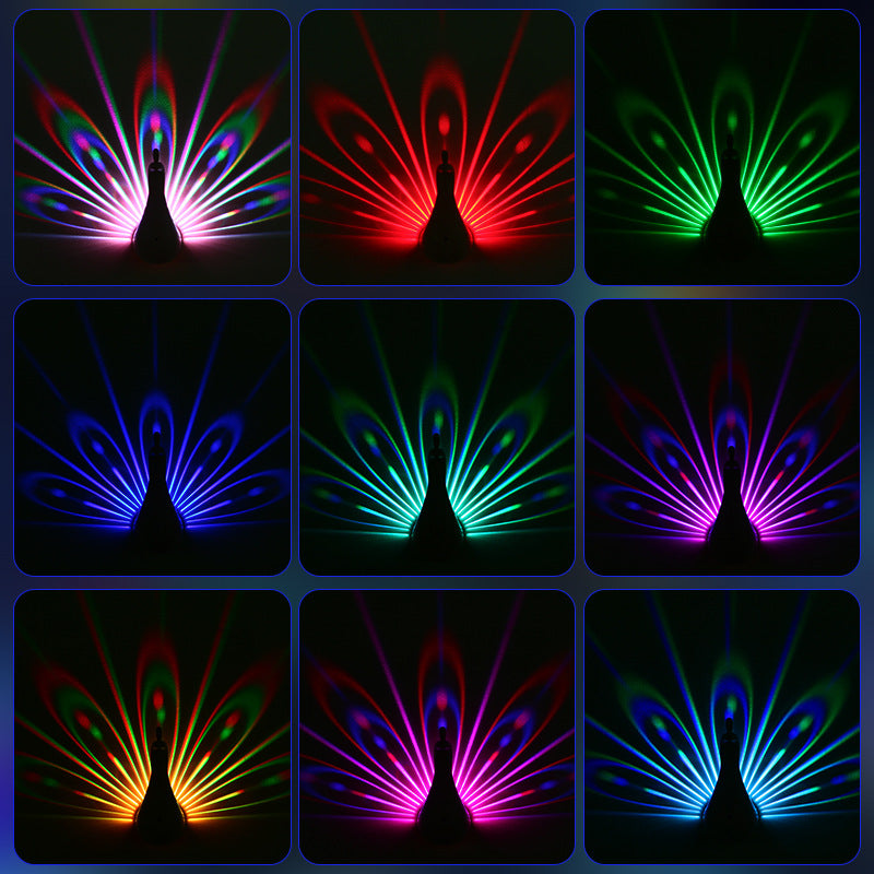 Zeitgenössische kreative wiederaufladbare ABS-Silica-Eisen-Pfauen-Projektions-LED-Wandleuchte Nachttischlampe für das Schlafzimmer 