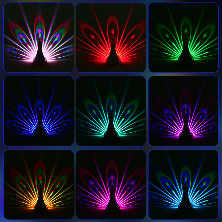 Zeitgenössische kreative wiederaufladbare ABS-Silica-Eisen-Pfauen-Projektions-LED-Wandleuchte Nachttischlampe für das Schlafzimmer 