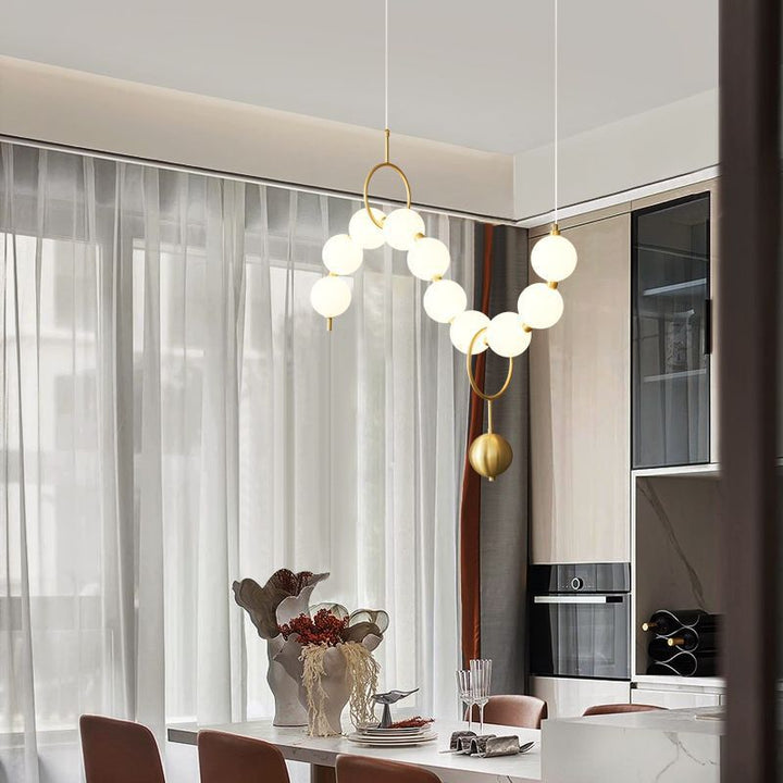 Lustre contemporain nordique en cuivre acrylique avec perles et perles LED pour salon 