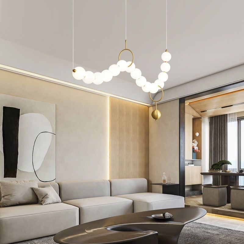Lustre contemporain nordique en cuivre acrylique avec perles et perles LED pour salon 