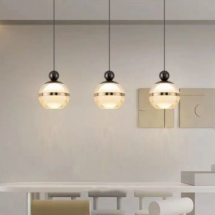 Zeitgenössische nordische Eisen-Aluminium-Acryl-Glaskugel hebbare LED-Pendelleuchte für das Bett 