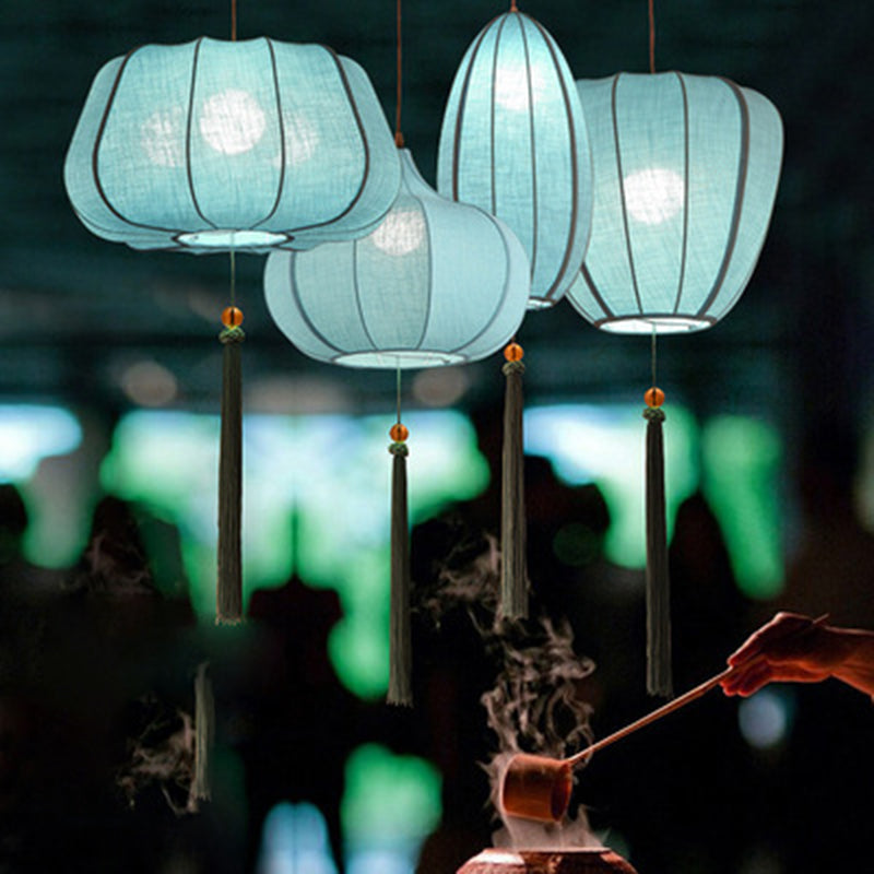 Traditionelle chinesische Laterne aus Eisenstoff in elliptischer Zylinderform mit Quasten, 1/3 Licht Kronleuchter für das Esszimmer 