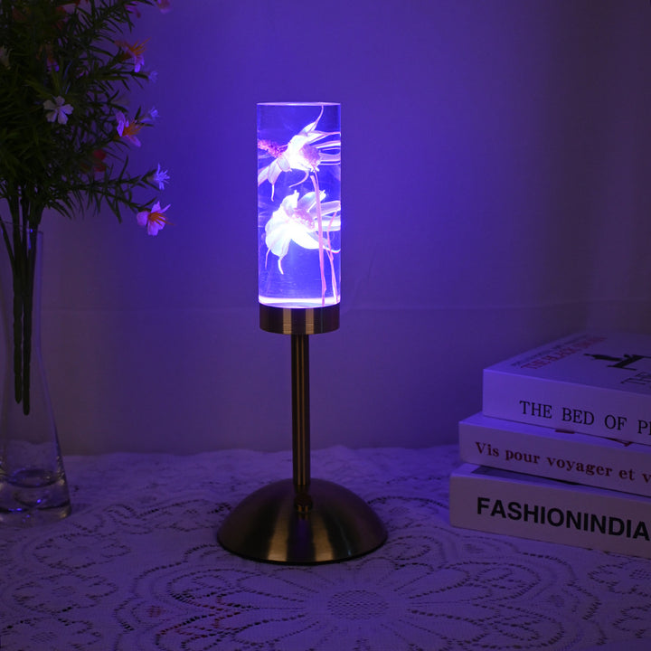 Zeitgenössische kreative USB-wiederaufladbare ewige Blume Gänseblümchen Löwenzylinder Eisen Acryl LED Tischlampe Nachtlicht für den Nachttisch 