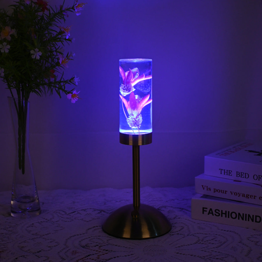 Zeitgenössische kreative USB-wiederaufladbare ewige Blume Gänseblümchen Löwenzylinder Eisen Acryl LED Tischlampe Nachtlicht für den Nachttisch 
