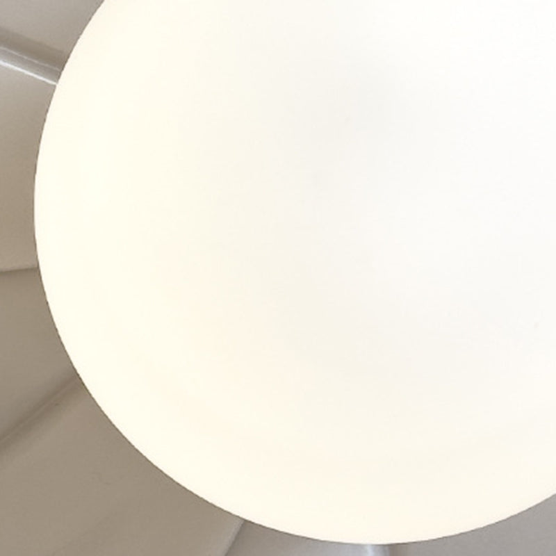 Zeitgenössische nordische Harzglas-Eisen-Blumenzugkette 1-Licht-Wandleuchte für das Bett 
