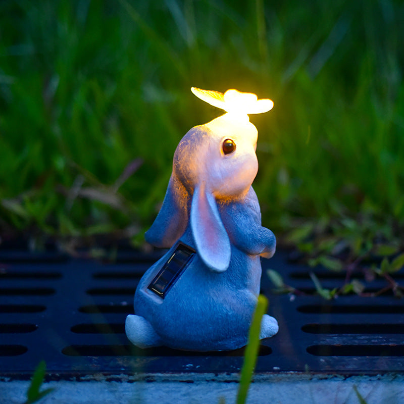 Modern Art Deco Solar Waterproof Resin Cartoon Rabbit Holding Flower Butterfly LED Outdoor Light Landscape Lighting For Garden