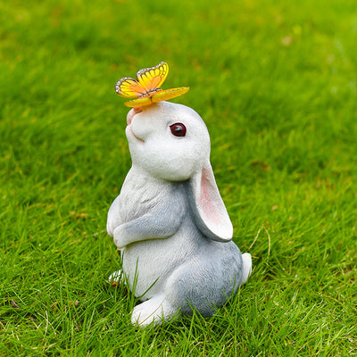Modern Art Deco Solar Waterproof Resin Cartoon Rabbit Holding Flower Butterfly LED Outdoor Light Landscape Lighting For Garden