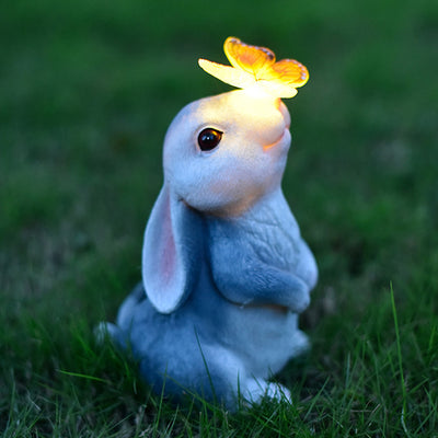 Modern Art Deco Solar Waterproof Resin Cartoon Rabbit Holding Flower Butterfly LED Outdoor Light Landscape Lighting For Garden